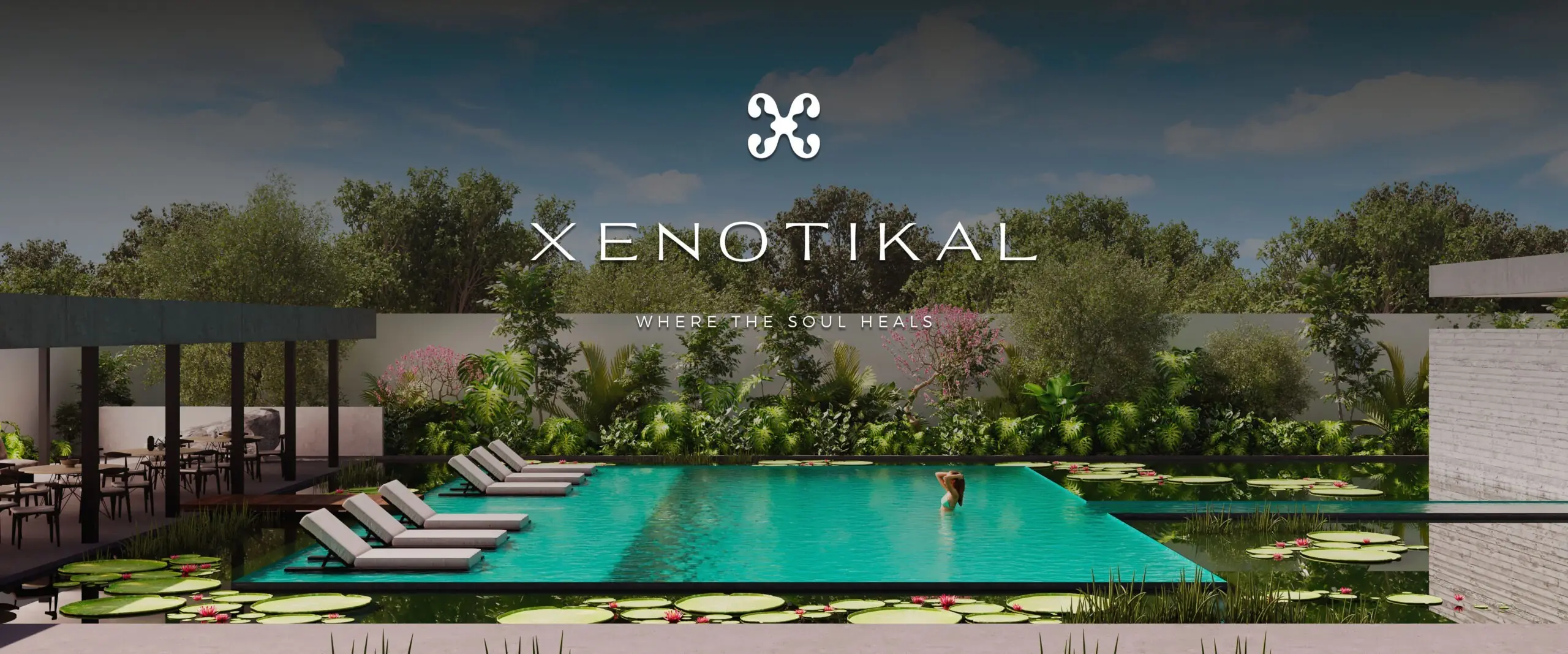 Casa club Xenotikal con alberca rodeada de vegetación tropical